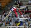 Courtney Kupets bars release straddle cut catch - 2004 Athens Summer Olympics